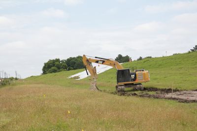 Entergy is hauling in truckloads of limestone rock to stabilize the base of the levee, after building more than 665 yards of matted road to gain access to hard-to-reach areas.